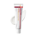 White cream tube with red label band and silver cap, Madeca Cream Time Reverse