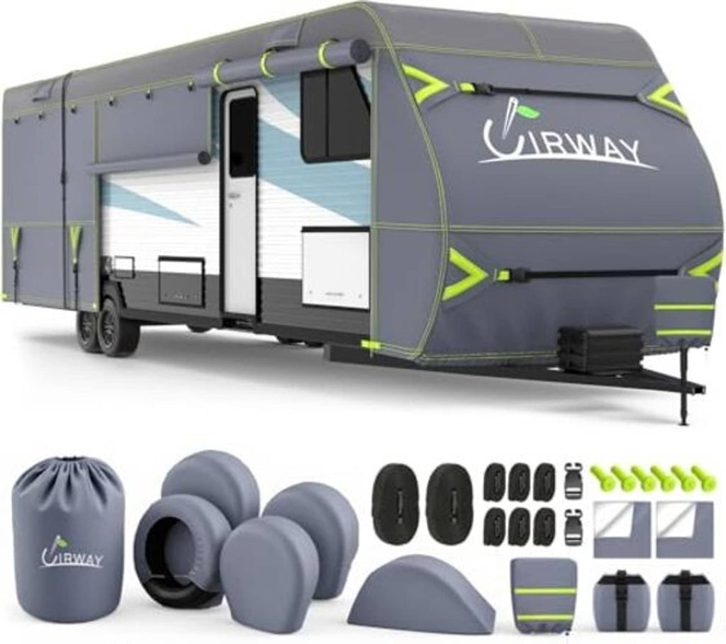 Gray RV trailer cover with neon-green trim; bundled caps, straps, and protective panel pieces.