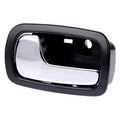 Interior door handle with black bezel and silver inner pull, left front replacement
