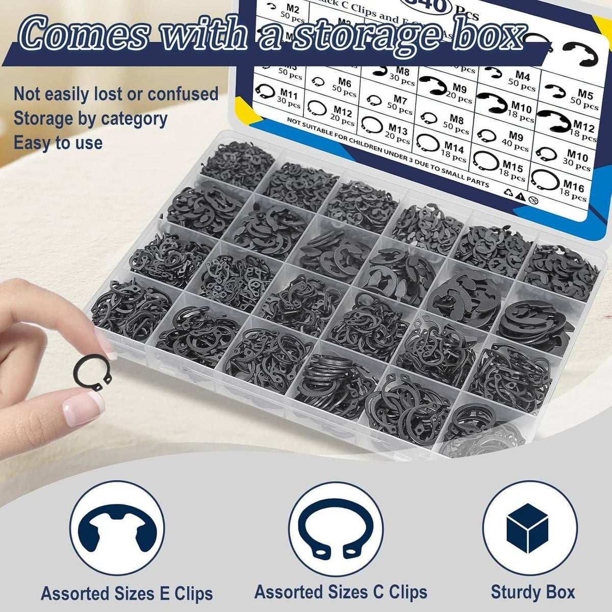 Black clip assortment storage box with categorized compartments and mixed C/E clips