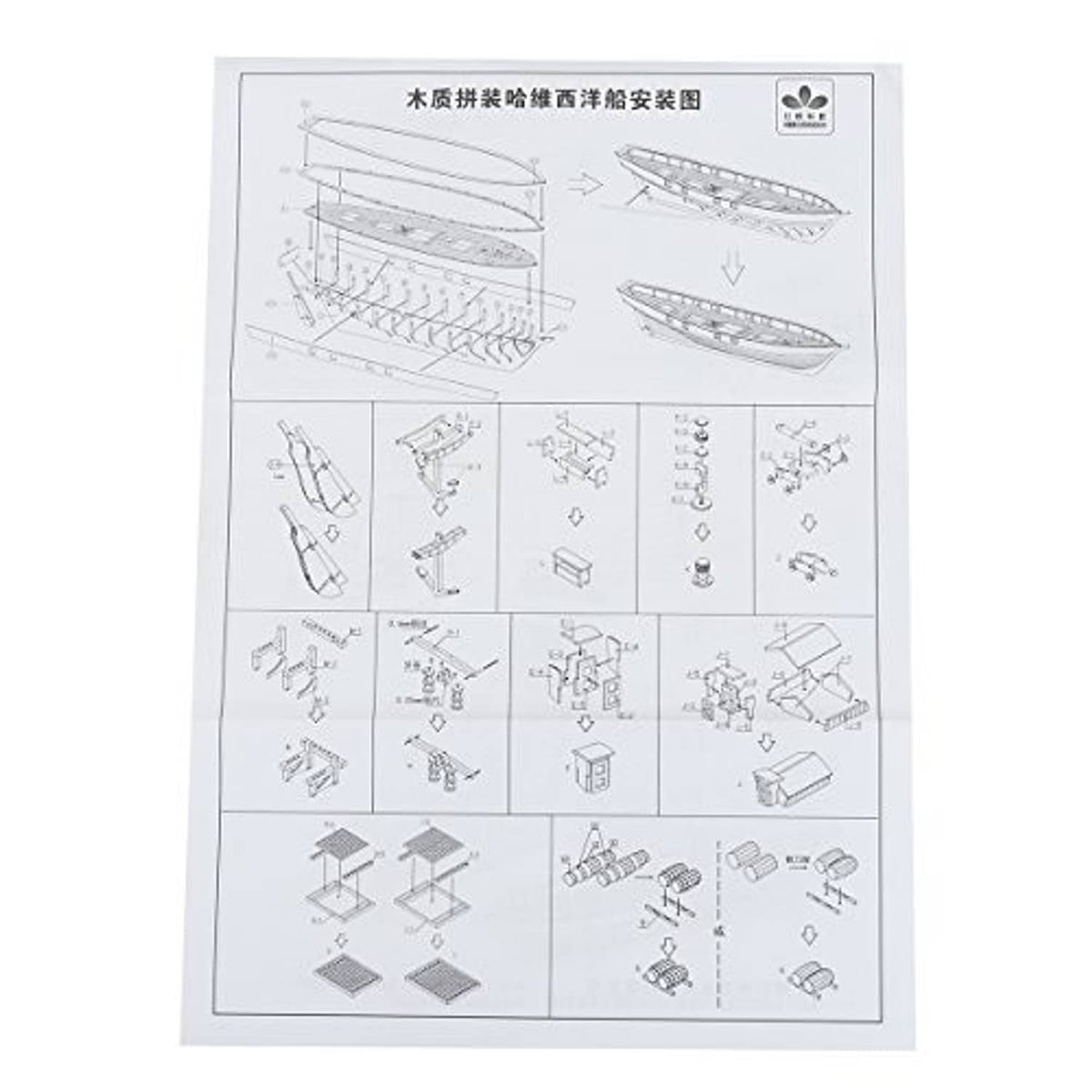 Printed assembly instruction sheet with diagrams for wooden sailboat