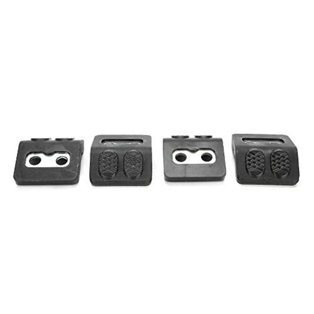 Four black tire changer jaw protectors showing silver two-hole metal inserts