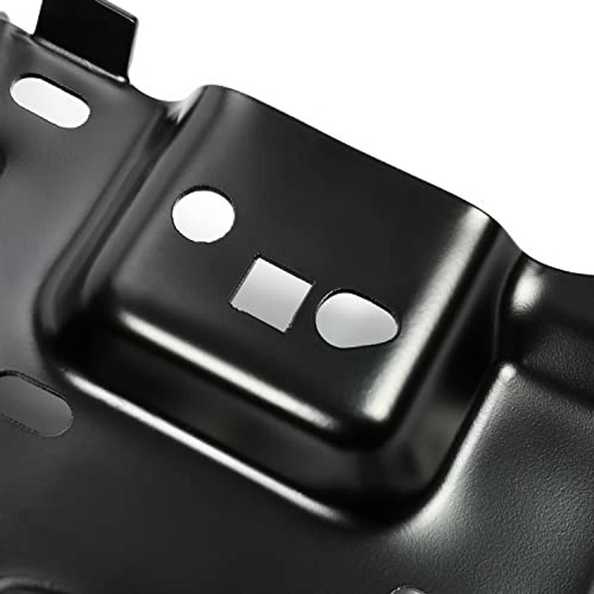 Close-up of black metal front bumper bracket with circular and slot holes
