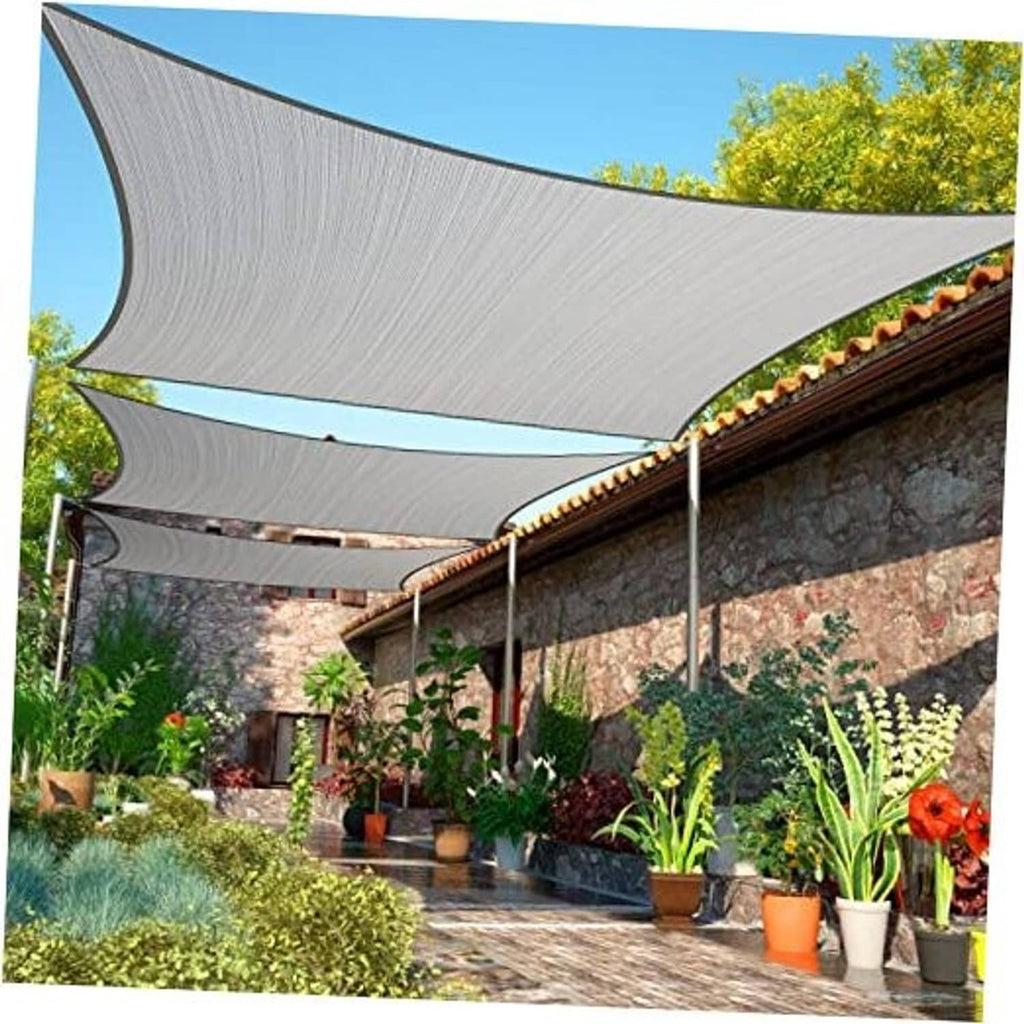 Grey rectangle sun shade sail canopy fabric stretched overhead with grommet corners