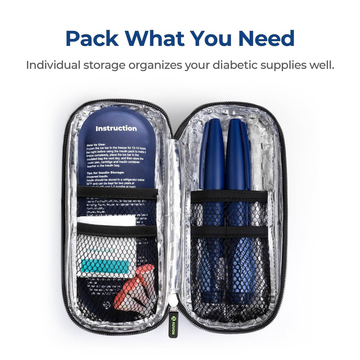 Navy insulin cooler case opened, showing two blue insulation sleeves and instruction panel