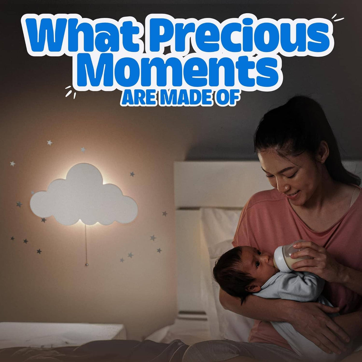 Wall-mounted white cloud night light casting warm light on nursery wall