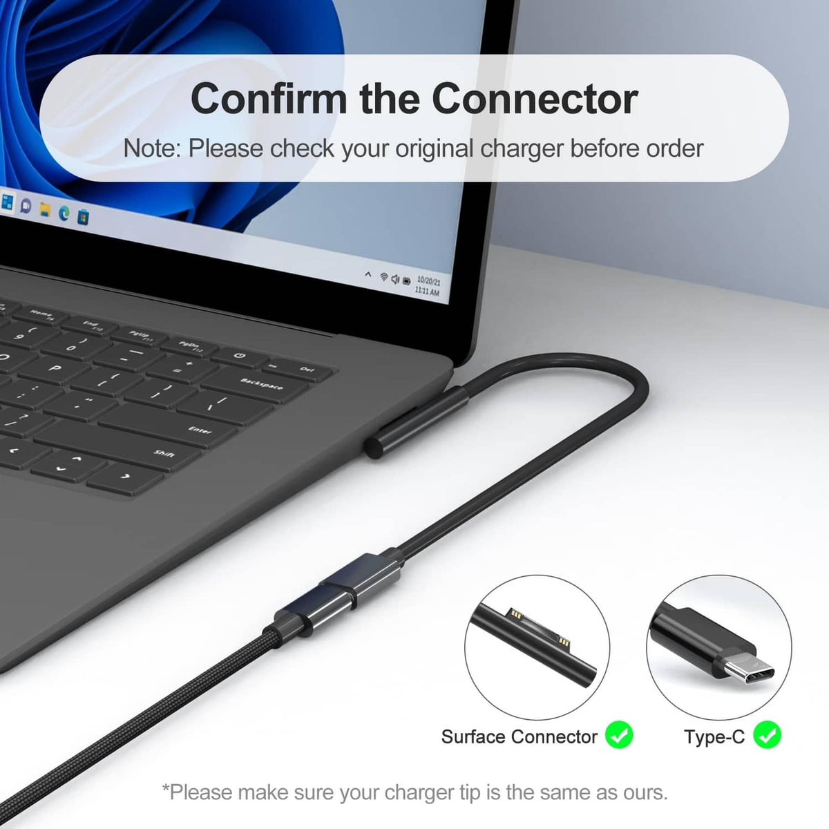 Black charging cable with Surface connector plugged into laptop