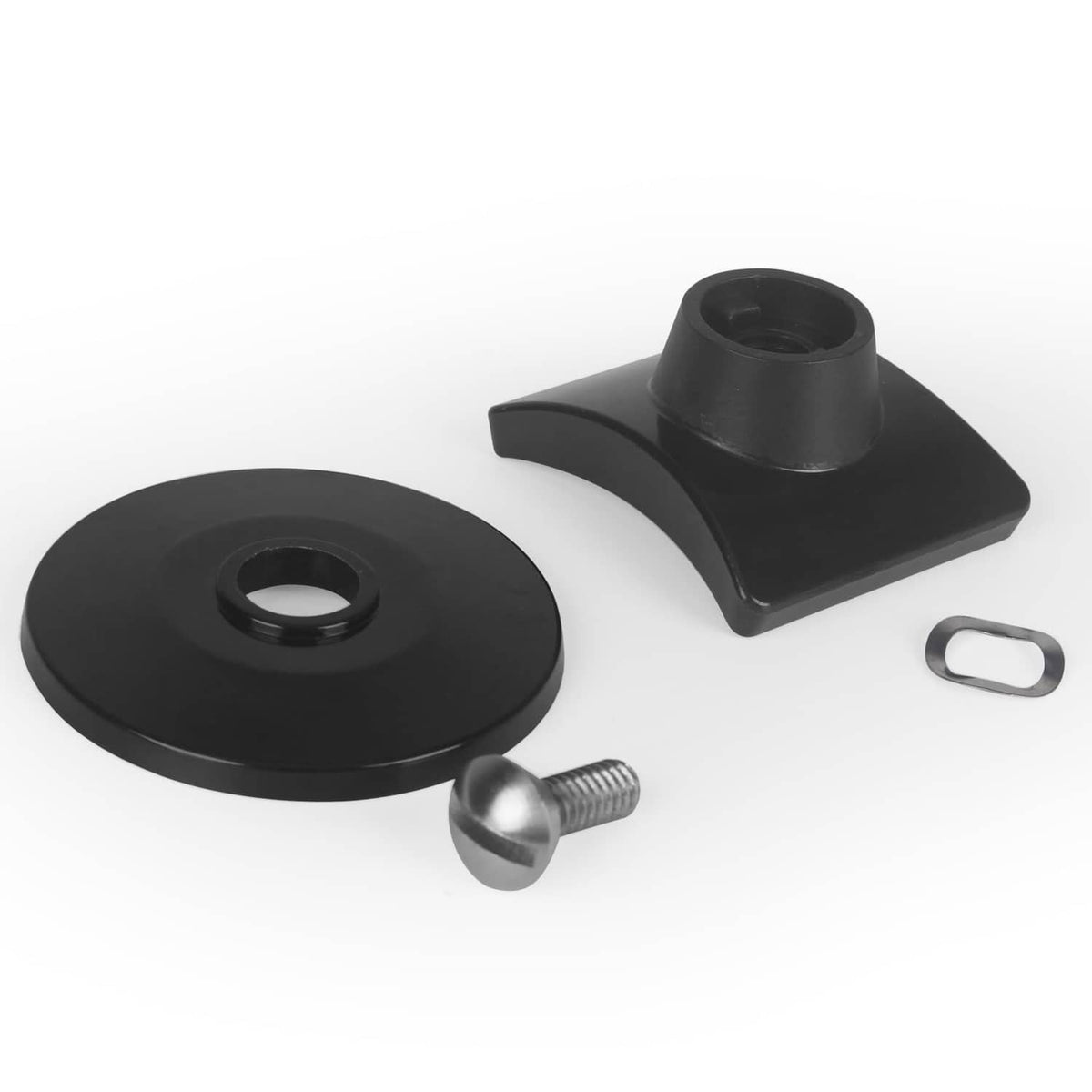 Set of black lid knob components: base, side piece, screw and retaining ring