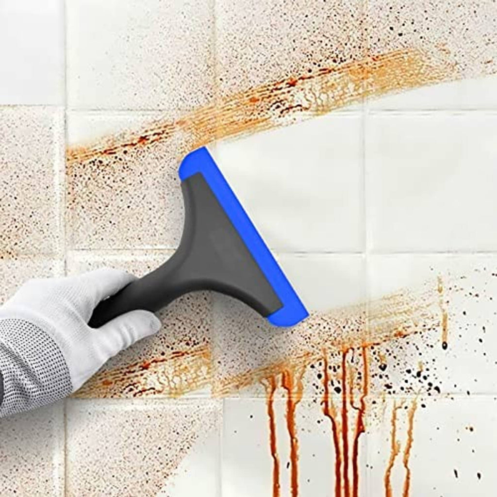 Blue-and-black window squeegee scraping grime from glass surface
