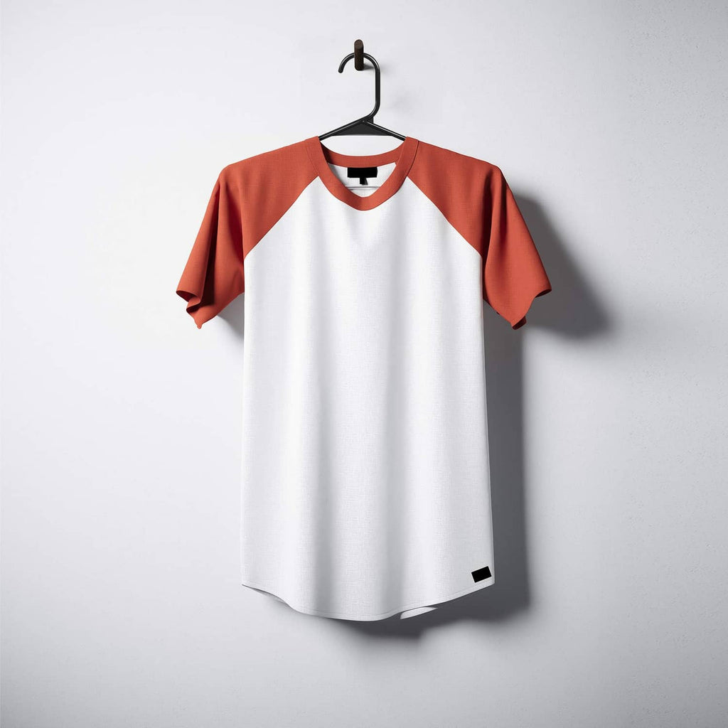 Black plastic hanger holding a white and rust orange raglan T-shirt
