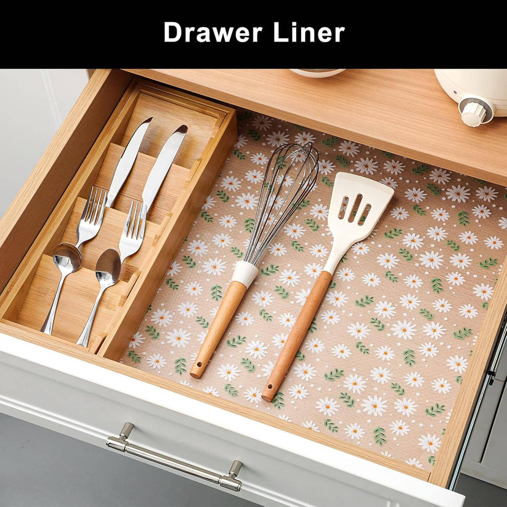 Non-adhesive drawer liner, beige with white daisy pattern, fitted on drawer base