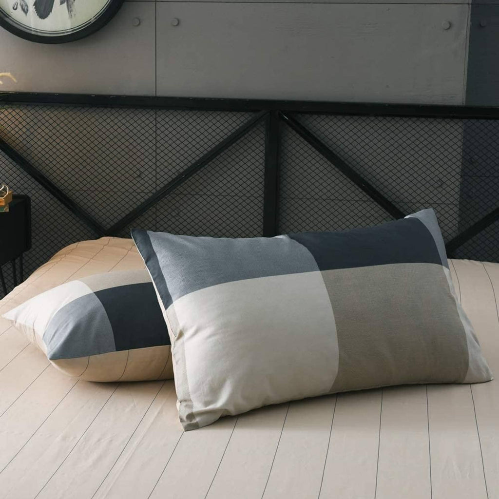 Pillow sham with navy and white check pattern from the comforter set
