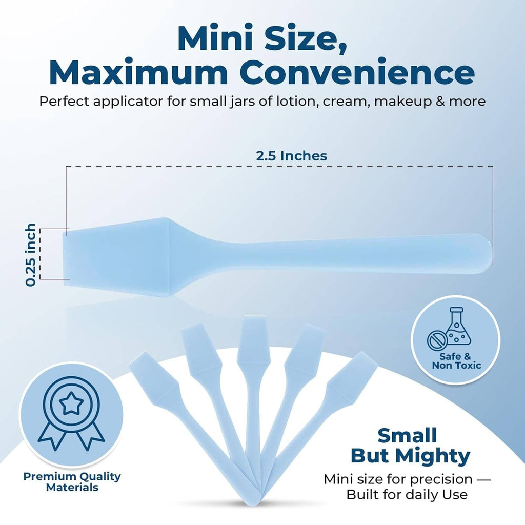 Sky blue mini skincare spatula with a flat precision tip and short handle