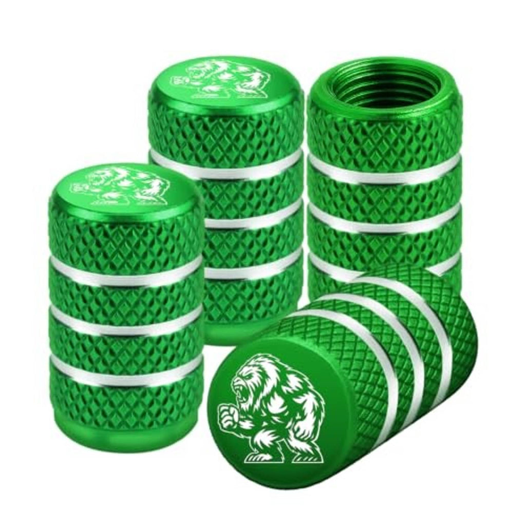 Four green Yeti tire valve stem caps, textured diamond grip with silver stripe rings.