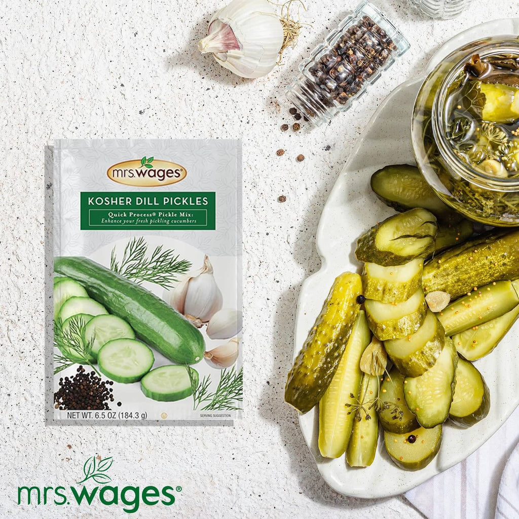 Mrs. Wages kosher dill pickles quick process mix packet with sliced pickles in a bowl
