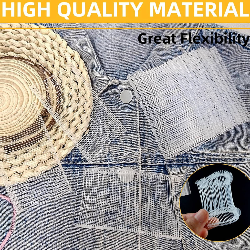 Clothing tag fastener clips with white prongs and transparent backing on denim