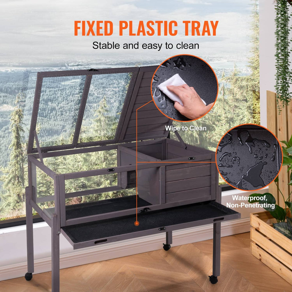 Gray wooden tortoise habitat with fixed plastic tray, wipe-clean front panel, on wheels