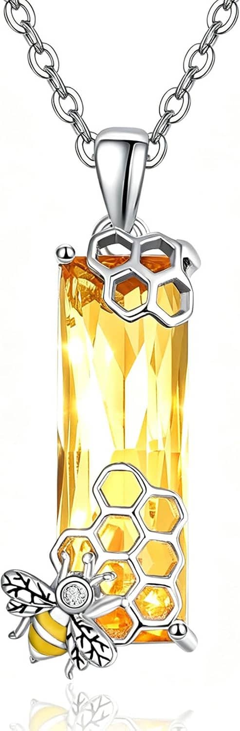 Silver necklace with rectangular honeycomb pendant and bee charm, crystal yellow center