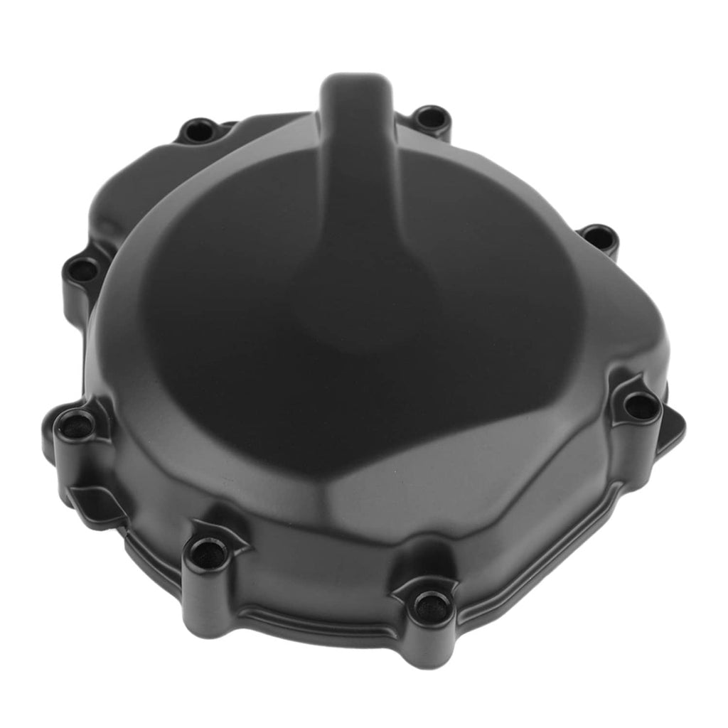 Left engine stator cover, dark gray with raised center boss and circular mounting holes