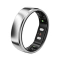 Silver smart ring with dark inner sensor module, angled view