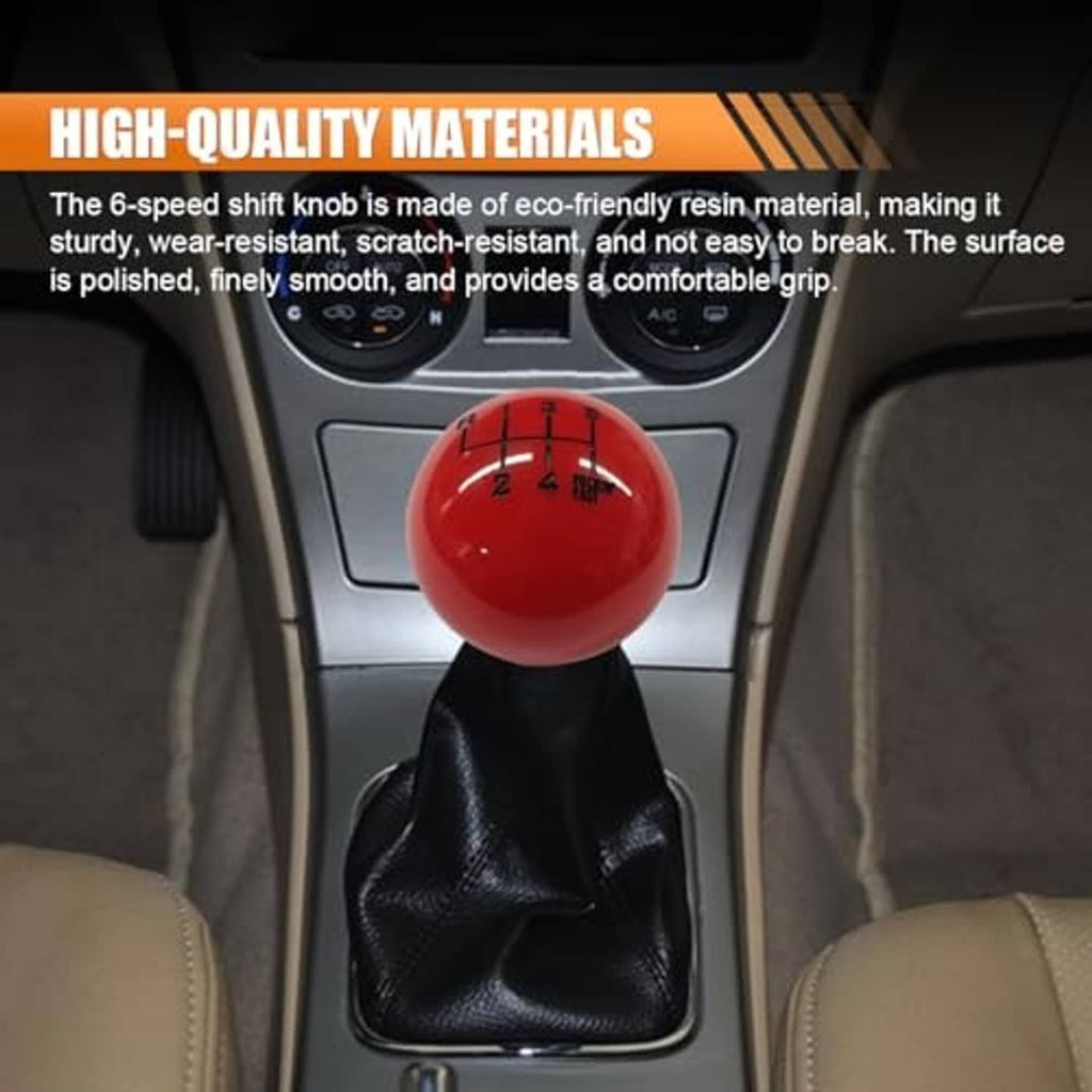 Red 6-speed gear shift knob with numbered grid on a shifter base and black boot