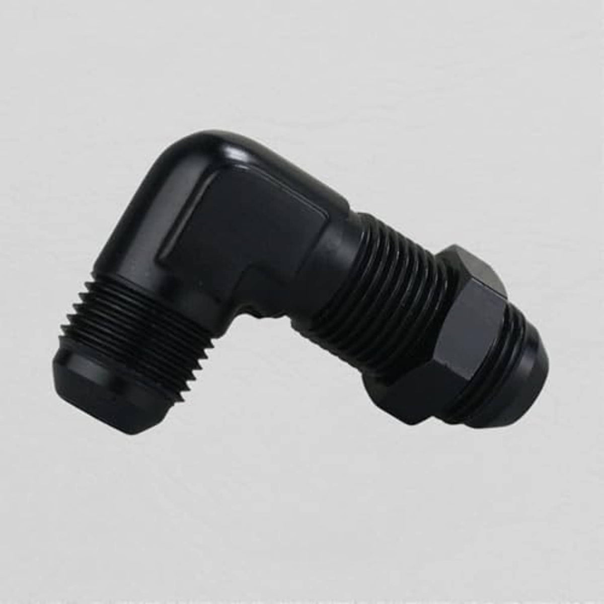 Black 90-degree bulkhead fitting adapter, close-up of threaded ends