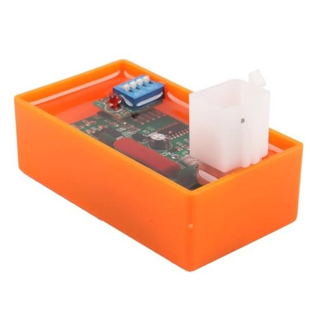 Orange CDI ignition module with white multi-pin connector on circuit board