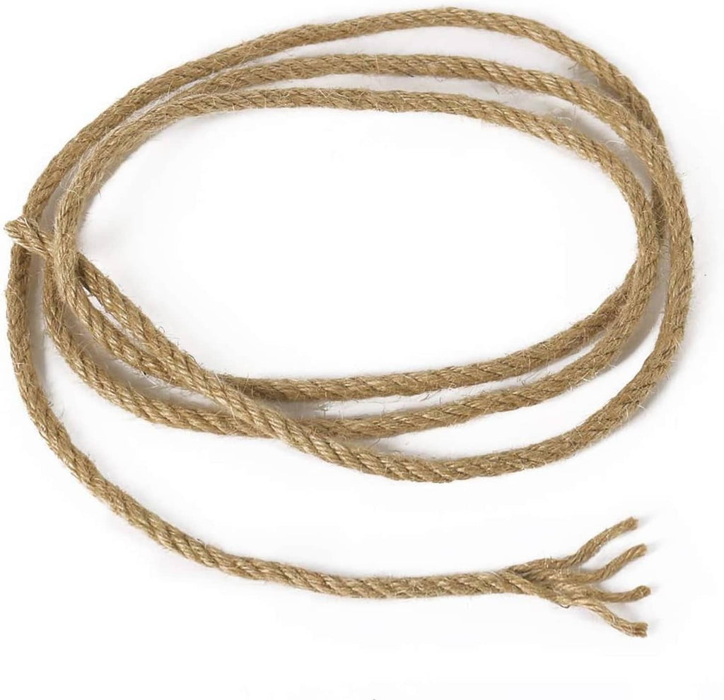 Natural jute rope laid in a long coil with loose frayed ends visible.