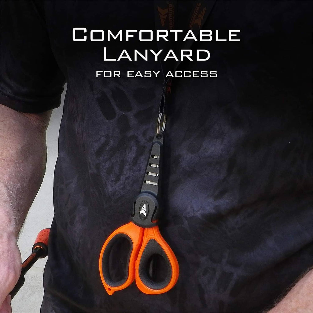 Orange-and-black fishing line scissors with black lanyard hanging from a sheath