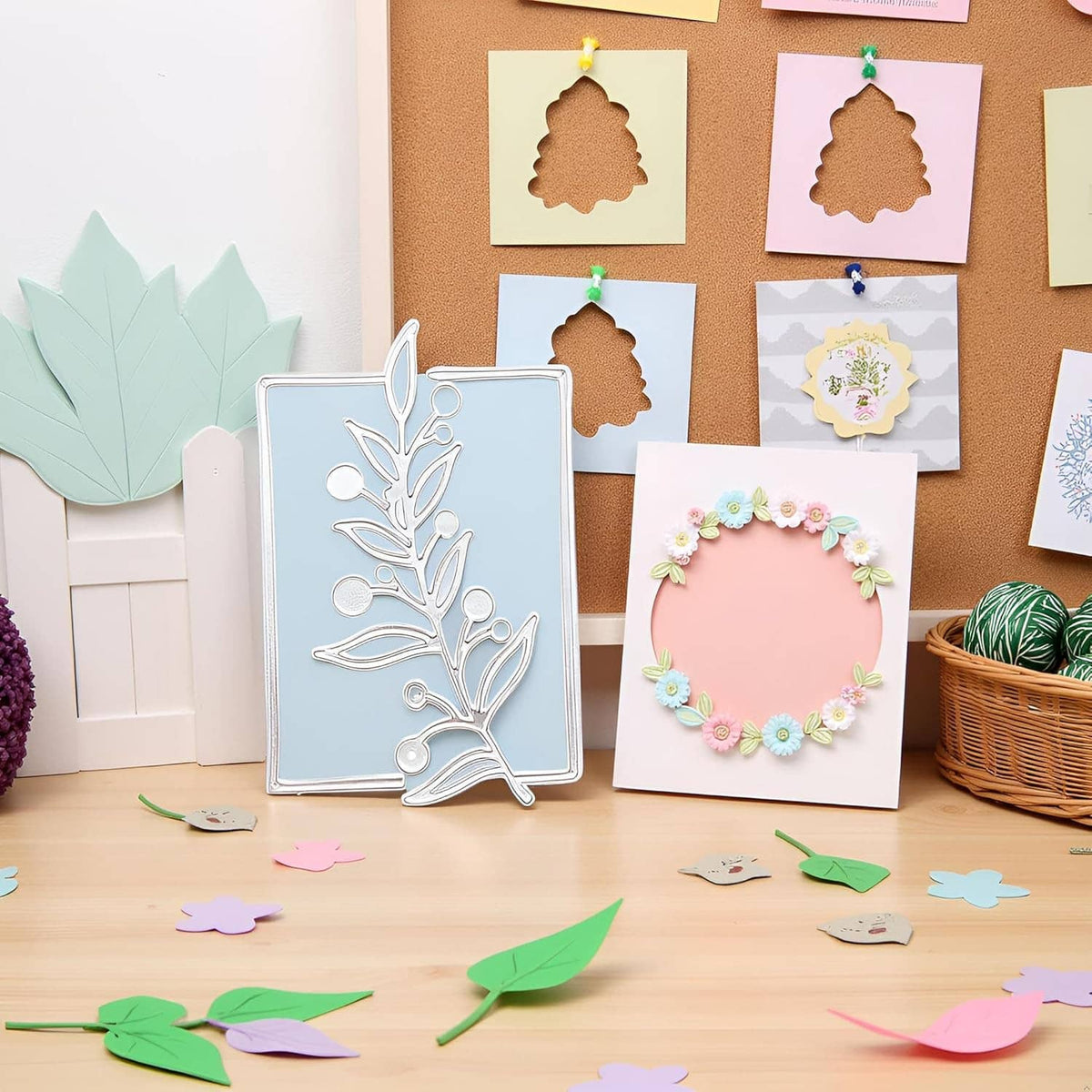Floral tree branch metal cutting die displayed with craft cards and cut shapes