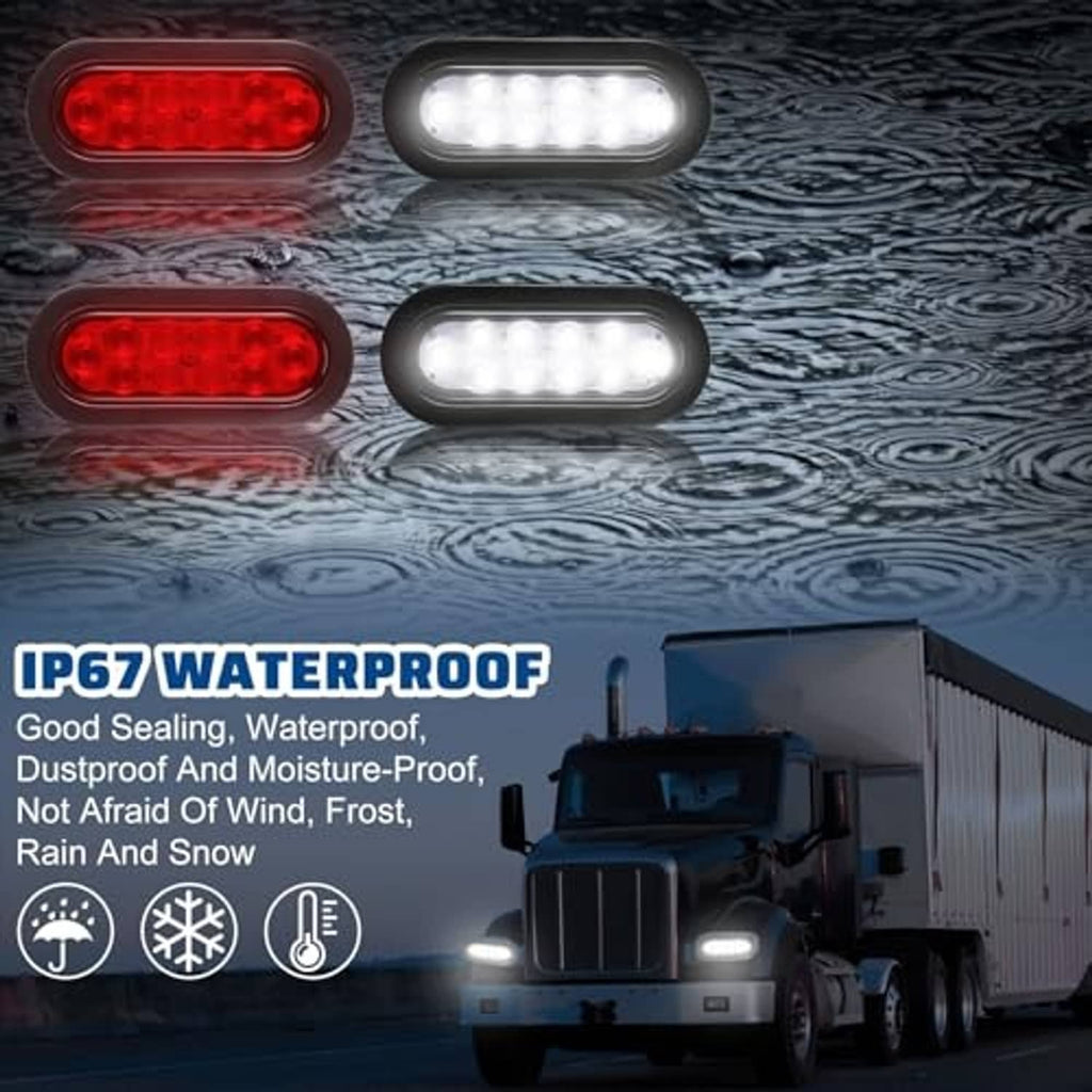 Four oval LED trailer lights glowing red and white, black housings