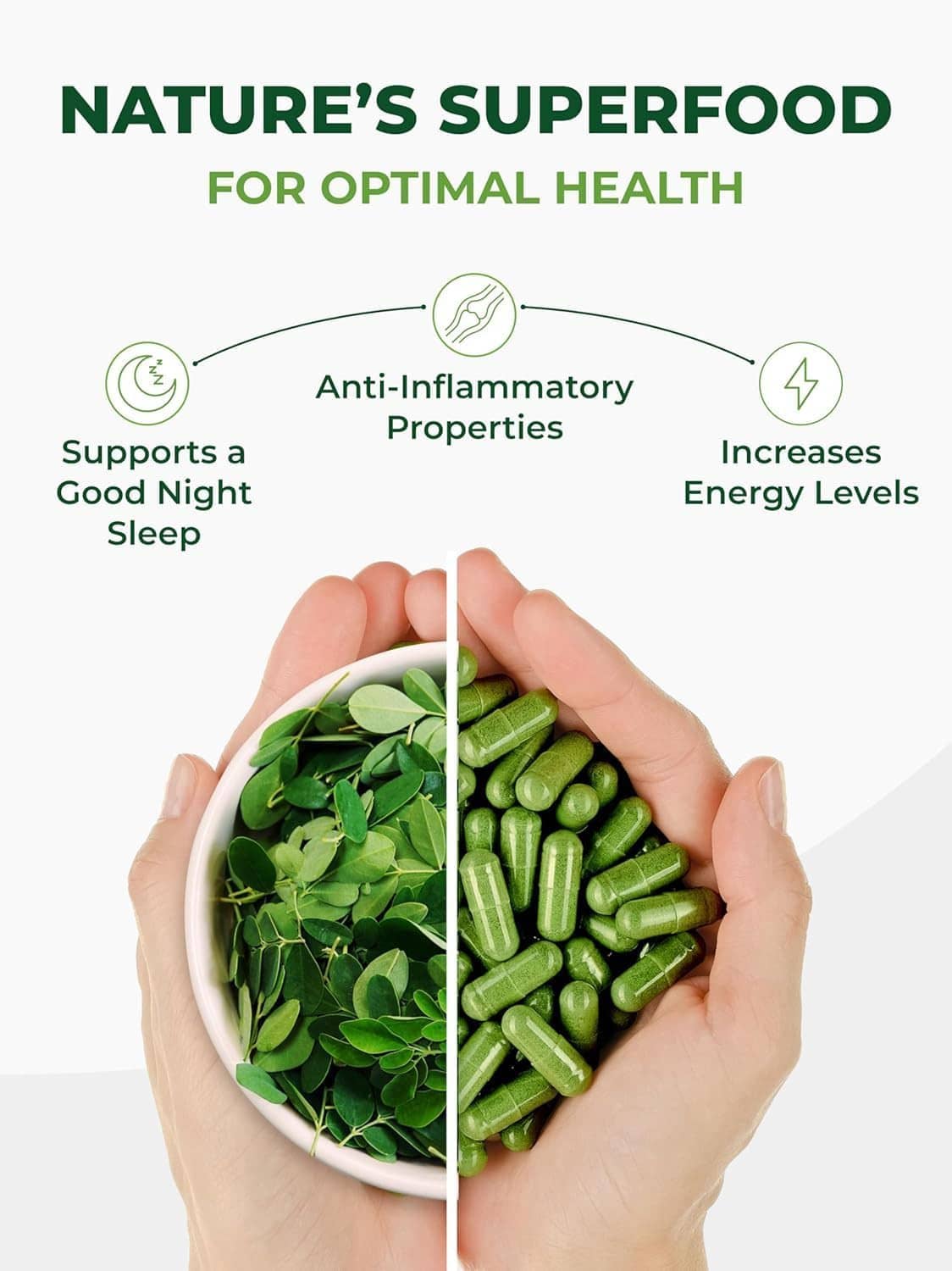 Hands holding a bowl with green moringa leaves and moringa capsules