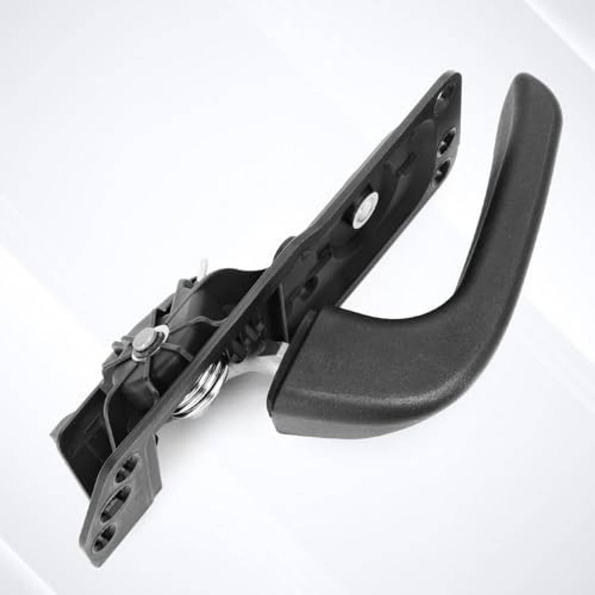 3D view of driver-side interior door handle kit with black handle and bracket