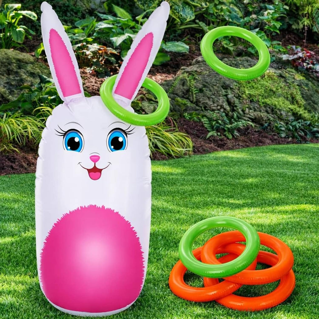 Inflatable bunny yard game figure in white with pink belly, plus green and orange rings