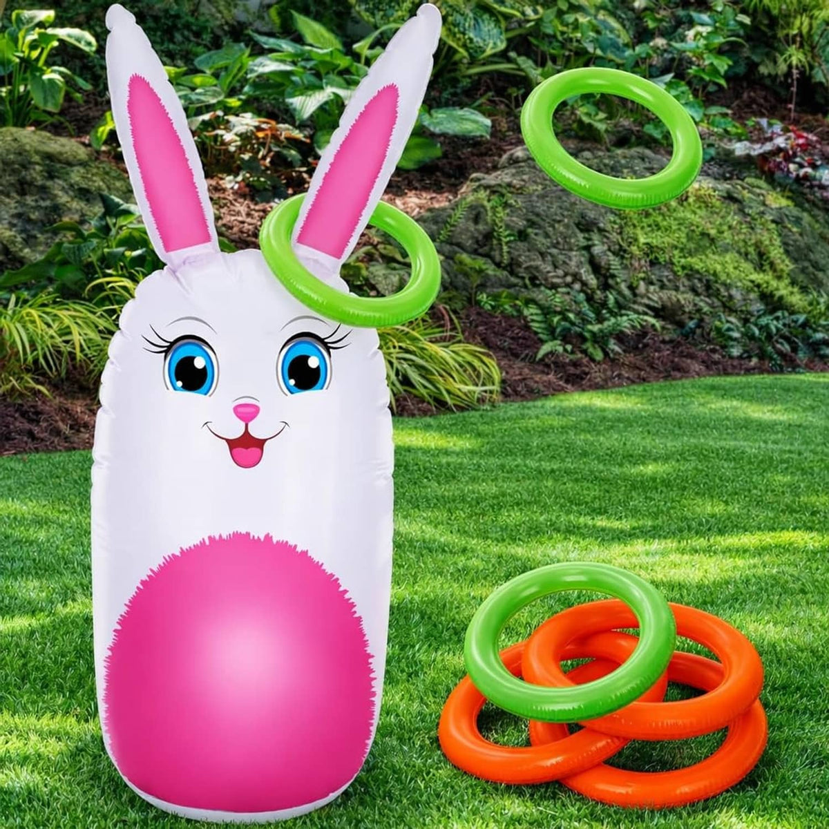 Inflatable bunny yard game figure in white with pink belly, plus green and orange rings