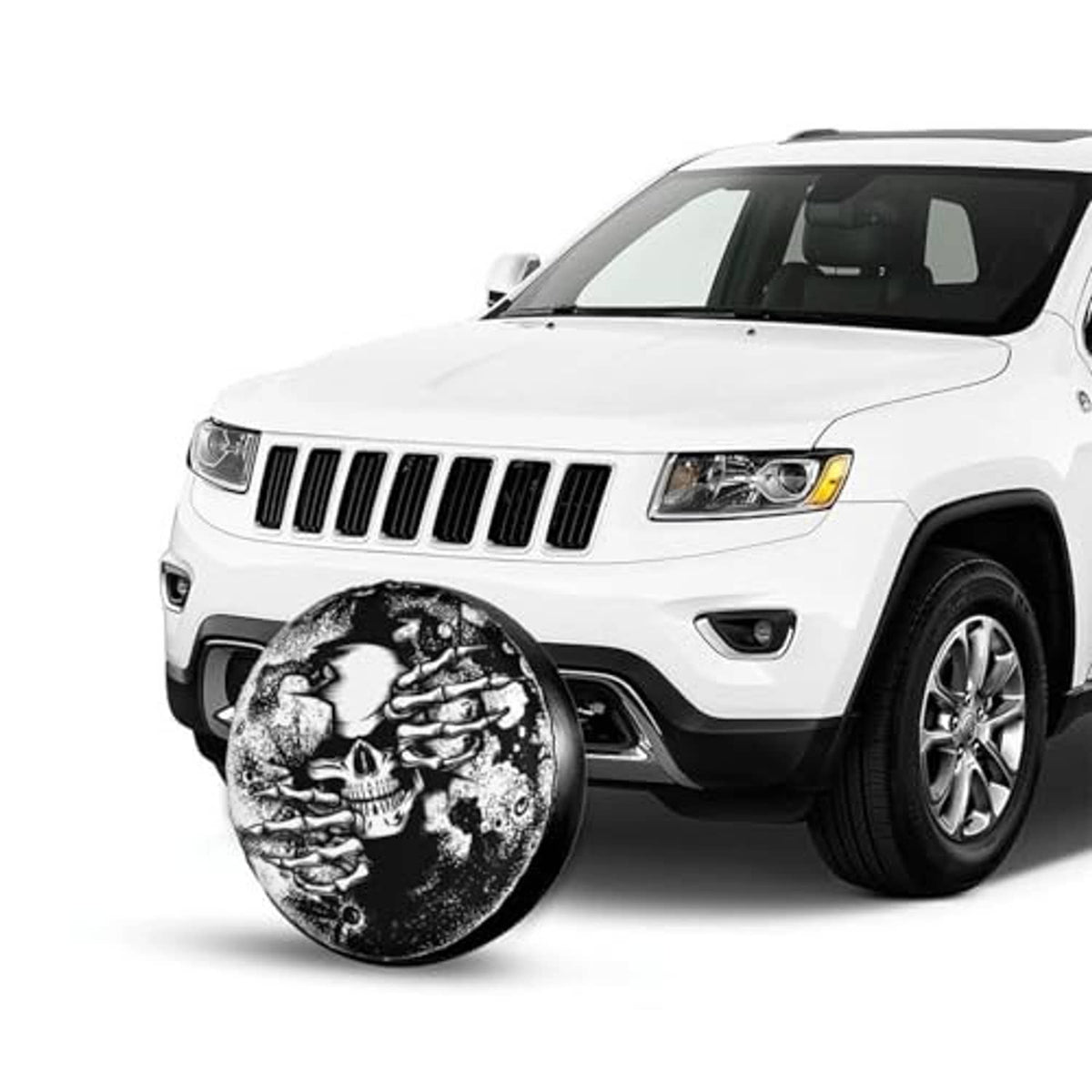 Skull spare tire cover mounted on a white SUV, round black-and-white design