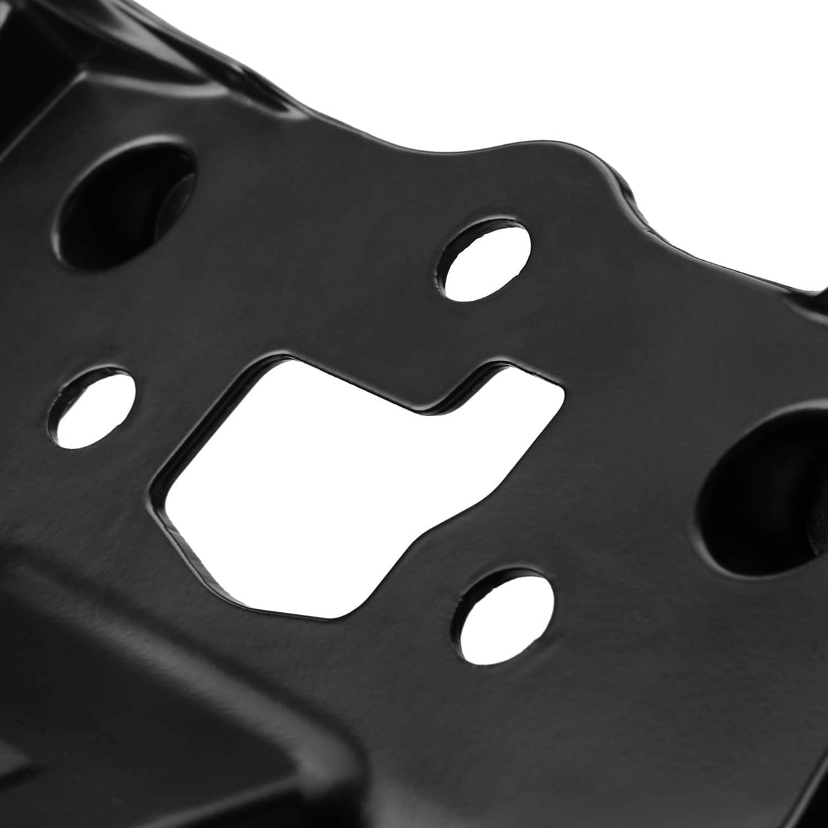 Close-up of black fairing stay bracket plate with large rectangular cutout