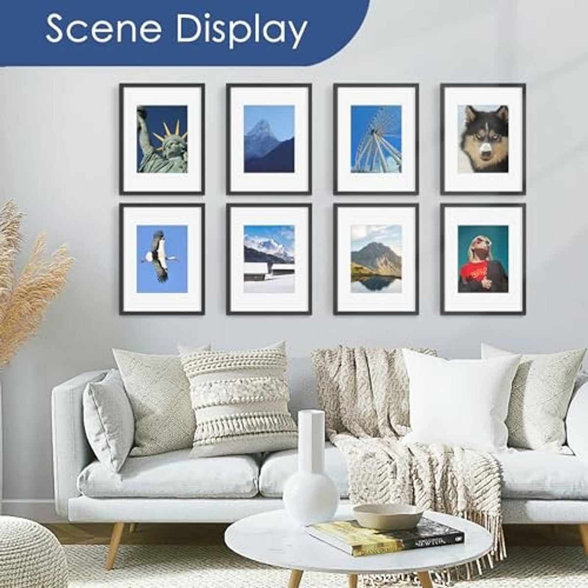 Black photo frames arranged on a wall with multiple small landscape pictures