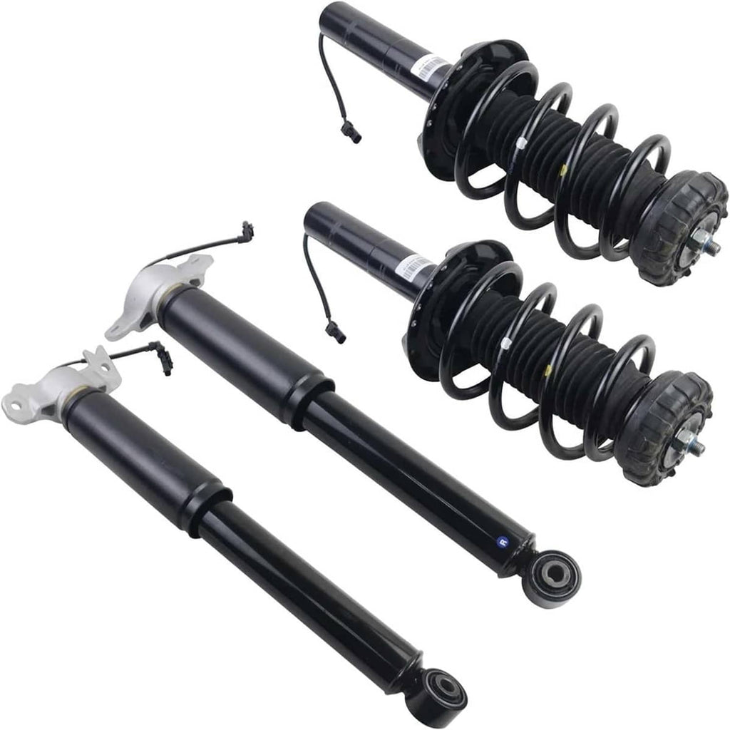Shock strut assemblies set showing parts: black dampers, coil springs, and mounts