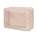 Beige compression packing cube with mesh front panel and zip closure