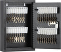 Wall-mounted key lock box, open door showing numbered key tags and brass keys