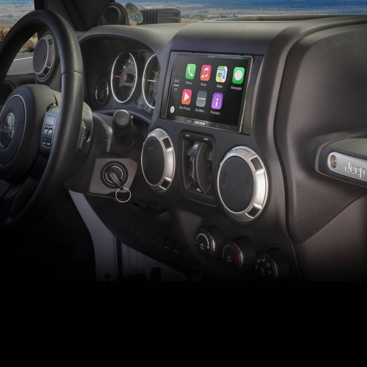 Double DIN stereo dash kit installation showing a touchscreen head unit in a car