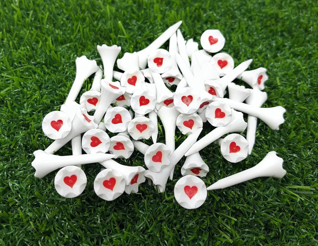 White plastic golf tees with red heart markers, short 1.5-inch size