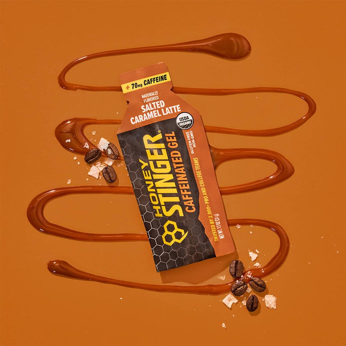 Honey Stinger salted caramel latte caffeinated gel pouch with caramel drizzle