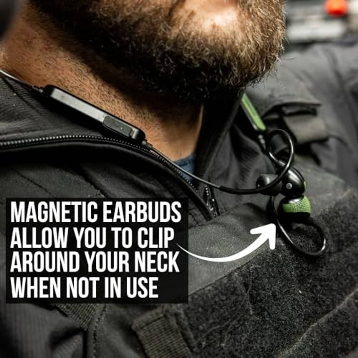 Magnetic earbuds clipped around neck on jacket with Bluetooth ear protection control unit