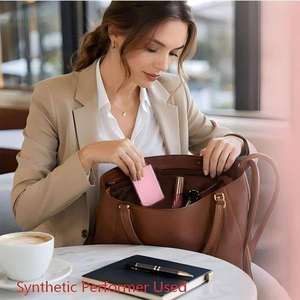 Slim gold aluminum business card holder on the open palm, professional card case