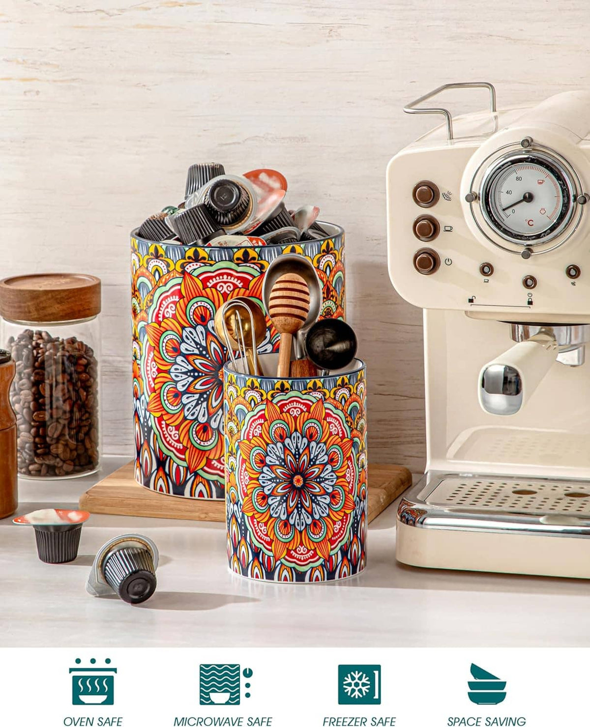 Floral patterned ceramic utensil holders with blue rims, filled with kitchen tools