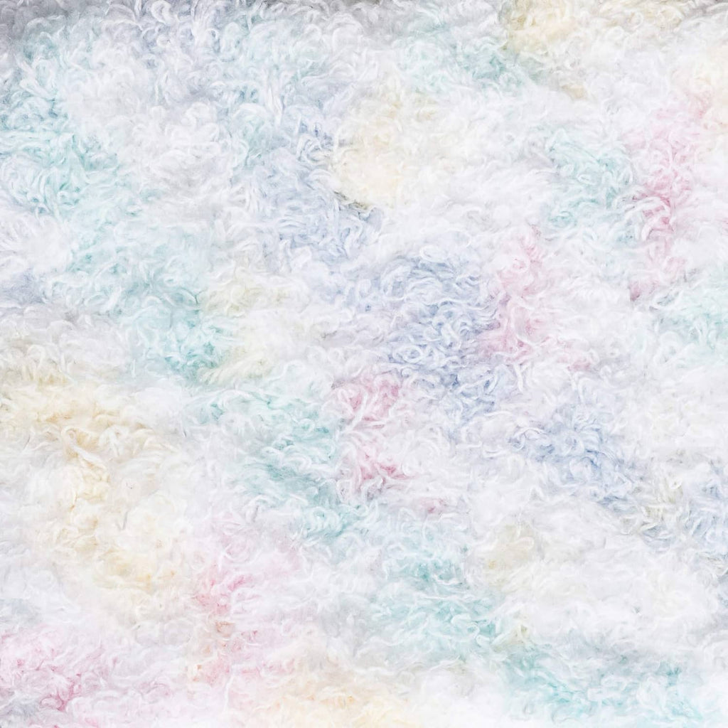 Multicolor fuzzy yarn texture with pastel blue, lavender, pink, and cream loops