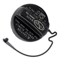 Black round gas fuel cap with tether strap and printed safety markings