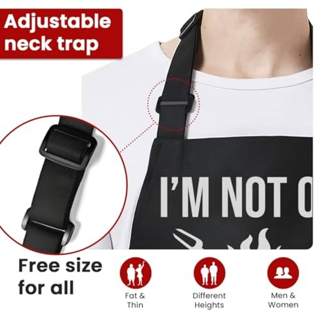 Men's black grilling apron with adjustable neck strap and 'I'm well seasoned' graphic